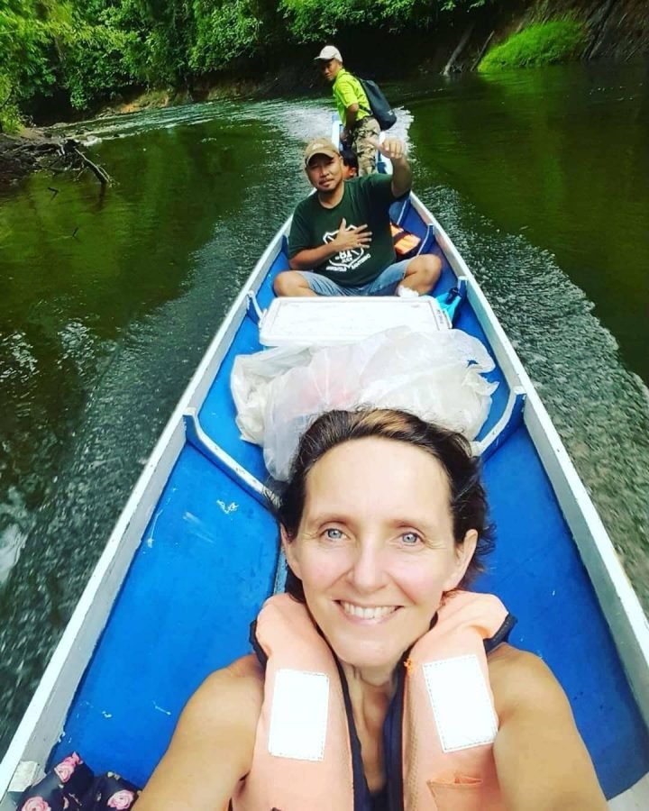 Journalist travel writer Tamara Thiessen on longboat trip, Batang Ai, Sarawak, Borneo