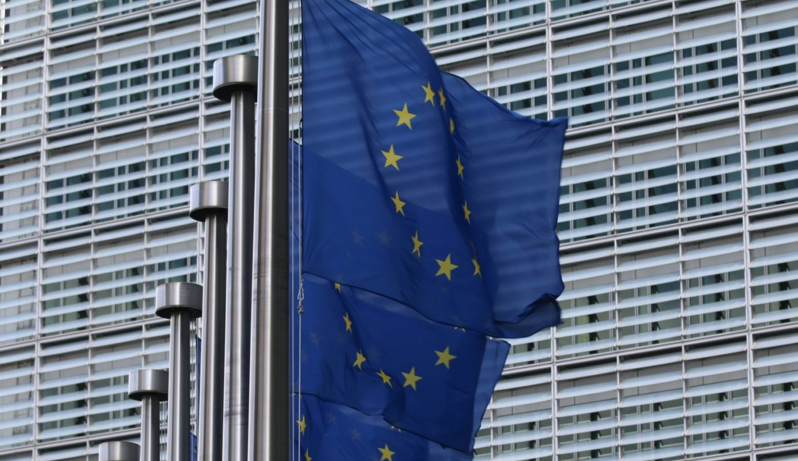 Europe flag brussels where the EU is moving to a new travel ban on US, Americans