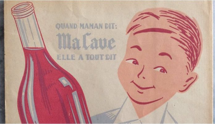 A boy smiling, holding a bottle of wine in France, and the words When mummy says, My Wine Cellar, she has said everything