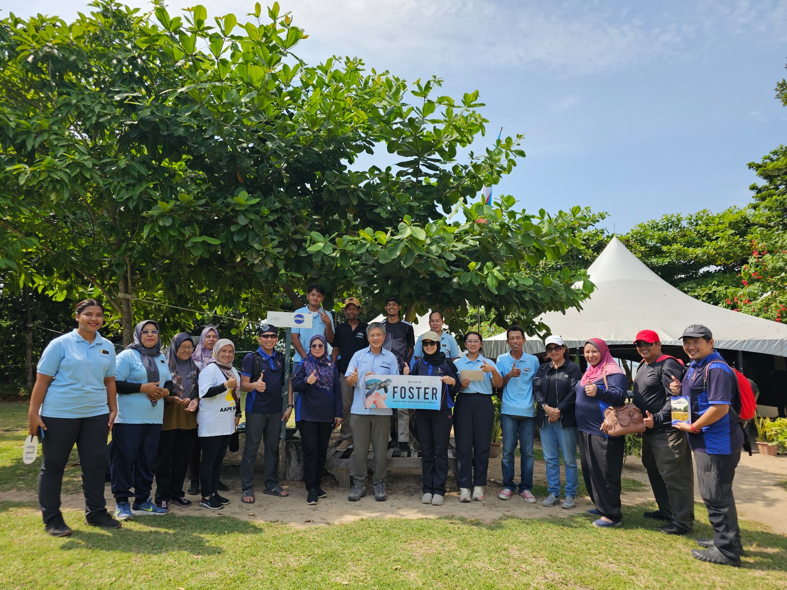 Alexander Yee with local Libaran turtle-activists and village-wardens who are battling to save Borneo's endangered sea turtles