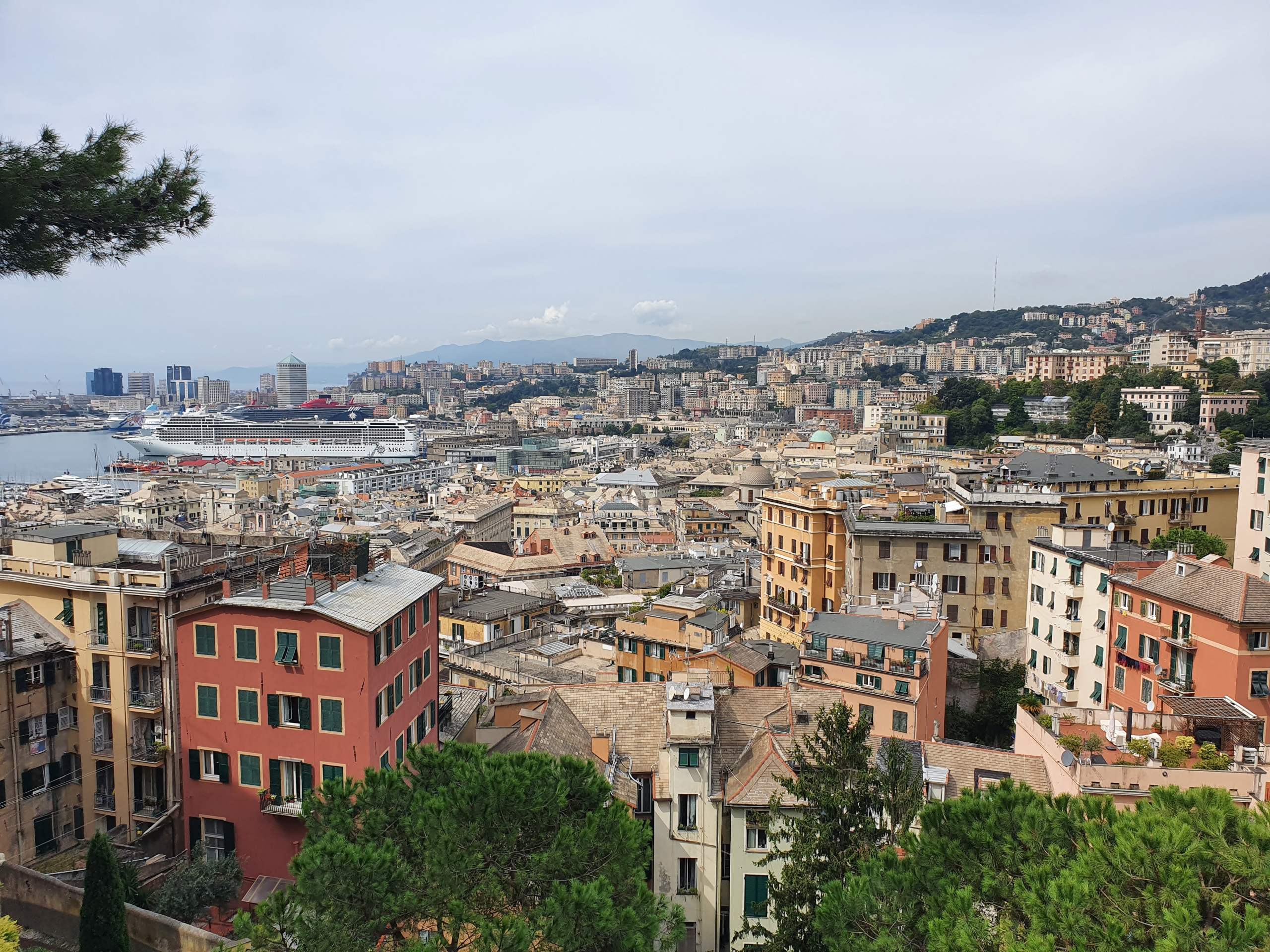 The rooftops of Genoa, Italy, the Ligurian capital spread to the sea