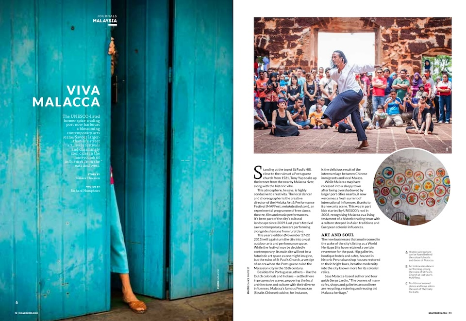 A blue door with a woman stepping out, and a man dancing in the street on the next page, in a story for Singapore Airlines